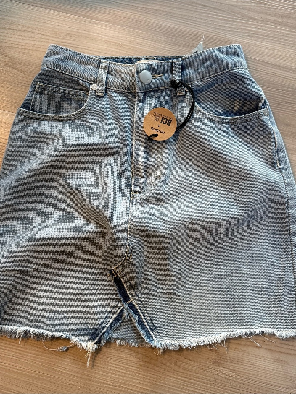 Cotton On High-Rise Frayed Hem Denim Skirt in Light Blue